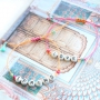 Quote jewellery with letter beads metal look and colourful details