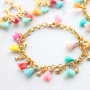 Trendy earrings and bracelets with mini tassels, DQ European metal charms and lobster clasps