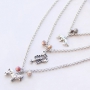 Elastic bracelets and layered necklaces with metal charms