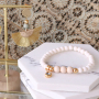 Bracelets and earrings with botanical colours and golden details