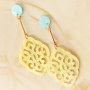Modern statement earrings with resin pendants