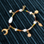 Create earrings and bracelets in wintery colours with glass seed beads