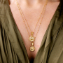 With the new brass TQ horoscope charms you can make these necklaces and earrings: