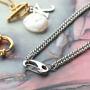 This is how you combine gold and silver in trendy jewellery made of stainless steel: