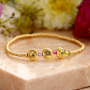 Create personalized bracelets with Birth Flower beads 
