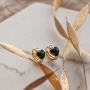 Combine these colourful rings and earrings with handmade jewellery