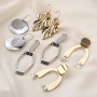 Earring inspiration with golden and silver charms and connectors