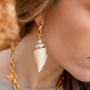 Get creative with large shell pendants