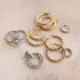 Tips for wearing statement stainless steel earrings