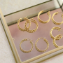 Tips for wearing statement stainless steel earrings