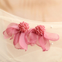 Create a unique look with flower earrings