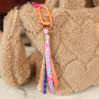 Create unique bracelets, keychains, and gifts with ribbon text 