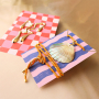 Combine trendy earrings with unique jewellery cards