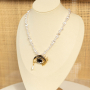 Mix & match with statement brooches