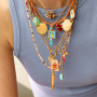 Create playful necklaces with stainless steel charms and letters