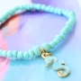 These colourful charms finish of your piece of summery jewellery
